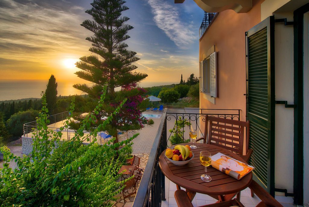 Outdoor image with coffee table and swimming pool